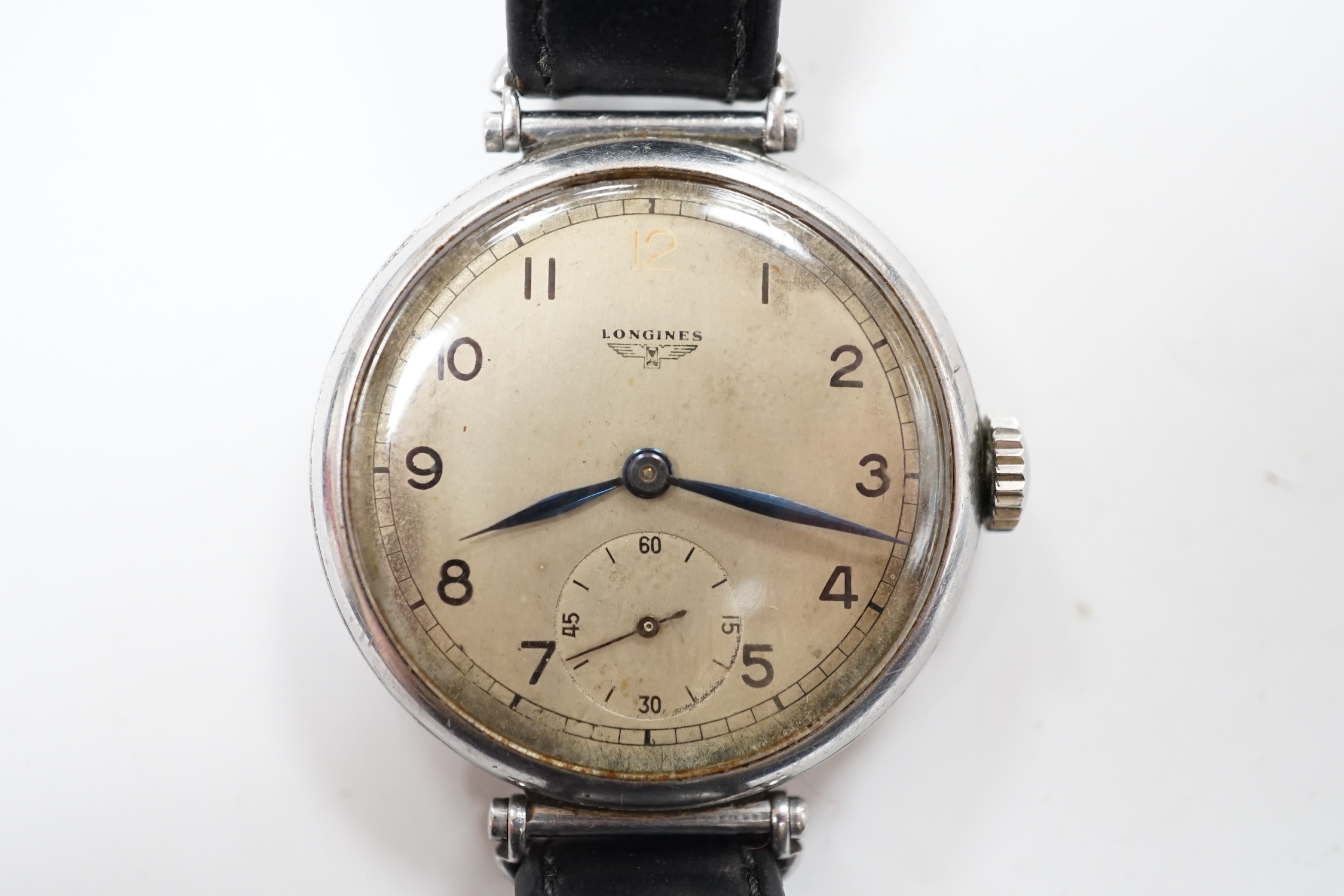 A gentleman's 1930's stainless steel Longines manual wind wrist watch, with Arabic dial and subsidiary seconds, movement c. 2.68Z, on a black leather strap.